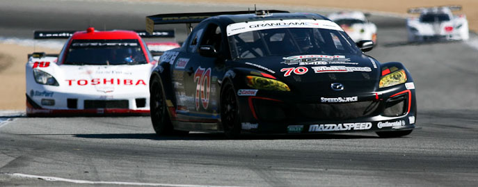 The Speedsource Mazda leads the Suntrust Chevrolet at Laguna Seca