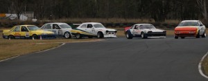 Craig Neilson 1983 Mitsubishi Starion leads the pack in the historic touring car race, featuring Group N cars