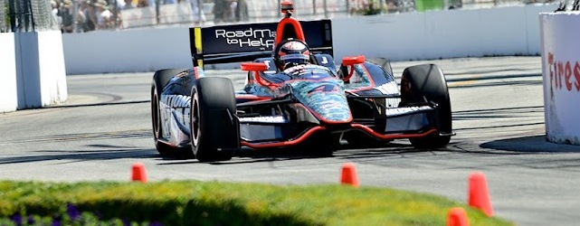 The Panther Racing Dallara picks its way through the streets (Jim Fonseca)