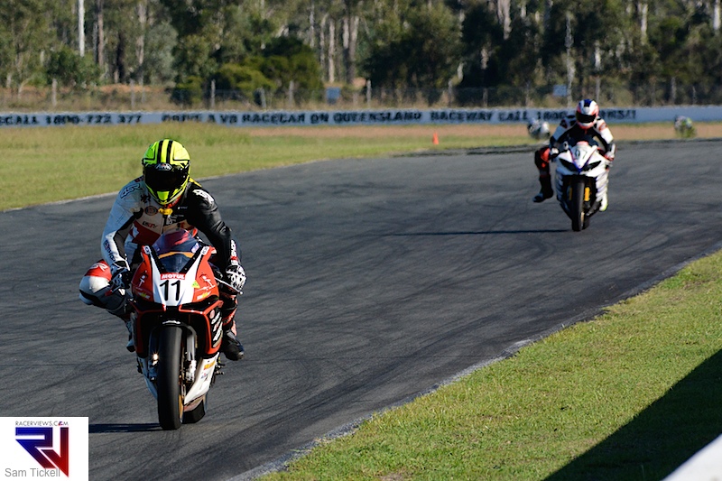 Phil Czaj races down the back straight at Queensland Raceway
