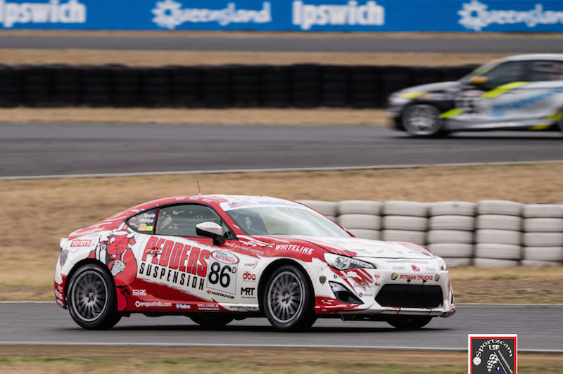 Pedders Racing's Grant Phillips and Andrew Turpie took out a class win and podium at Queensland Raceway