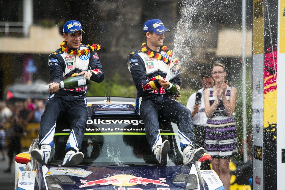 Sebastien Ogier, Julien Ingrassia celebrate on the podium during the FIA World Rally Championship 2015 in Trier, Germany on August 23, 2015 Photographer Credit Jaanus Ree/Red Bull Content Pool