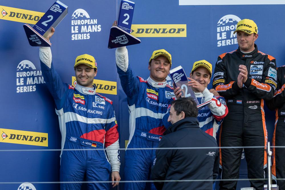 Andreas Wirth (Far left) celebrates with his SMP Racing teammates